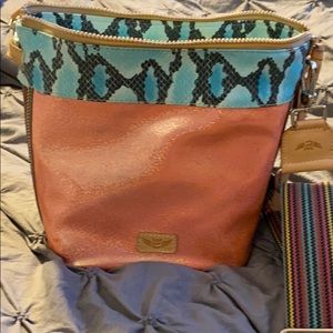 Consuela Carmen wedge bag.